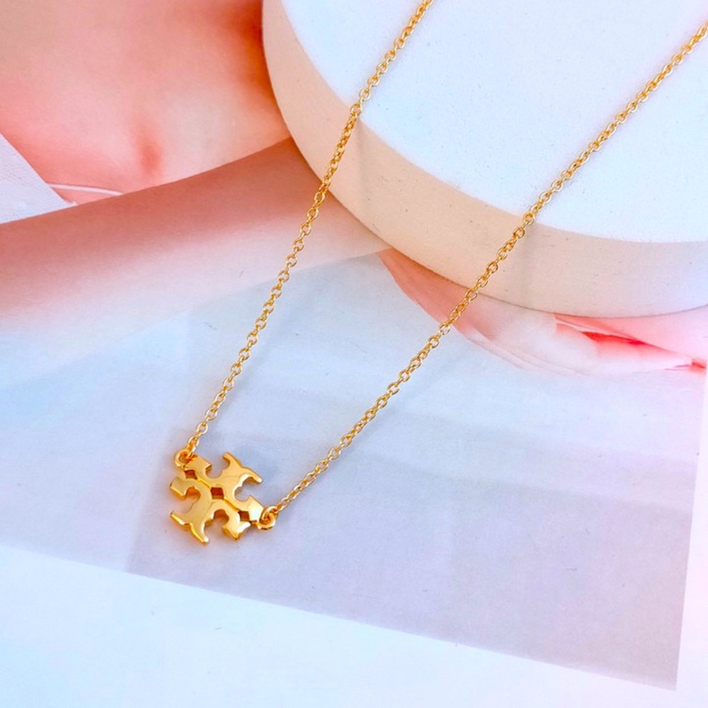 Tory Burch Gold Pendant Necklace - Picture 3 of 5